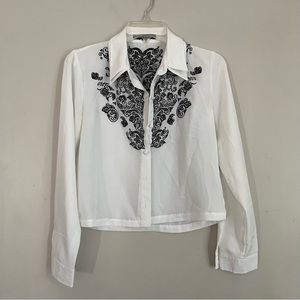 White button down with black detail